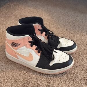 High rise air jordan shoes in peach black and white.